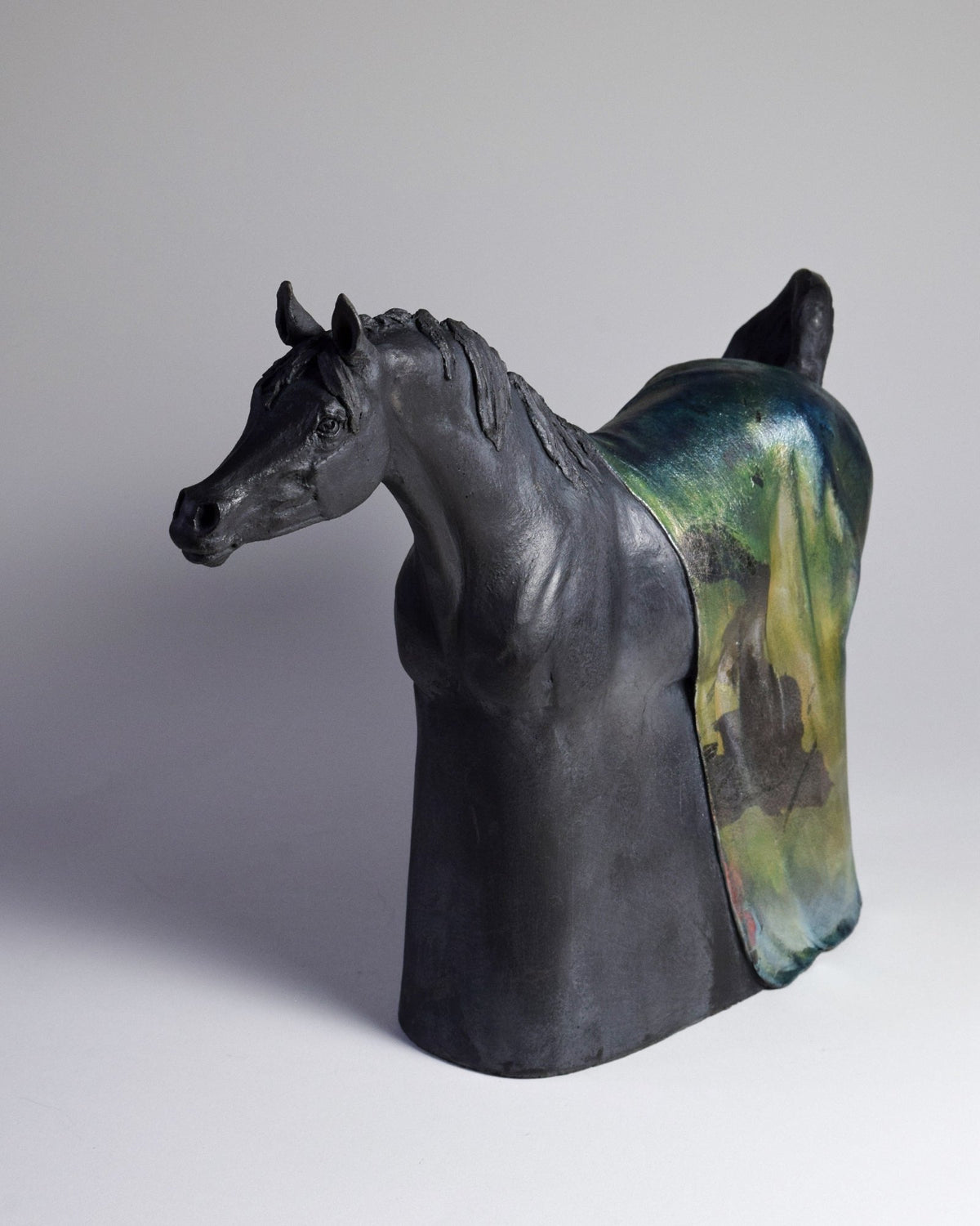 Black raku ceramic Arabian horse sculpture by Susie Benes