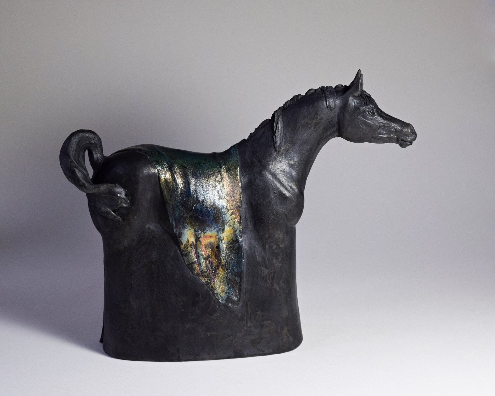 Black raku ceramic Arabian horse sculpture by Susie Benes