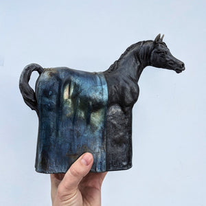 Black raku ceramic Arabian horse sculpture by Susie Benes