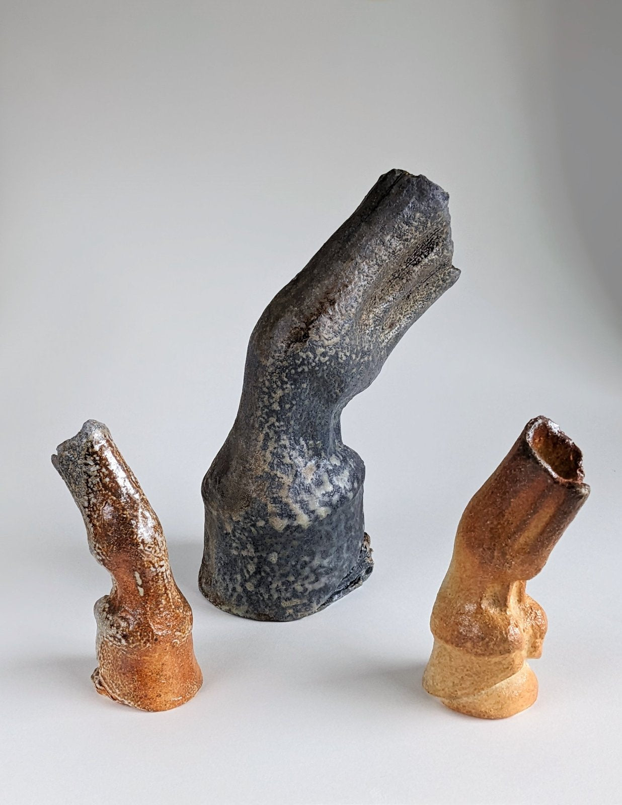 Wood fired ceramic horse hoof sculptures by Susie Benes