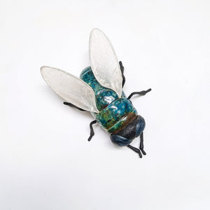 Giant fly wall sculpture from ceramic by Susie Benes