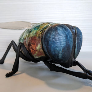 Giant fly wall sculpture from ceramic by Susie Benes