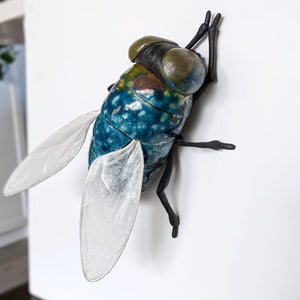 Giant fly wall sculpture from ceramic by Susie Benes