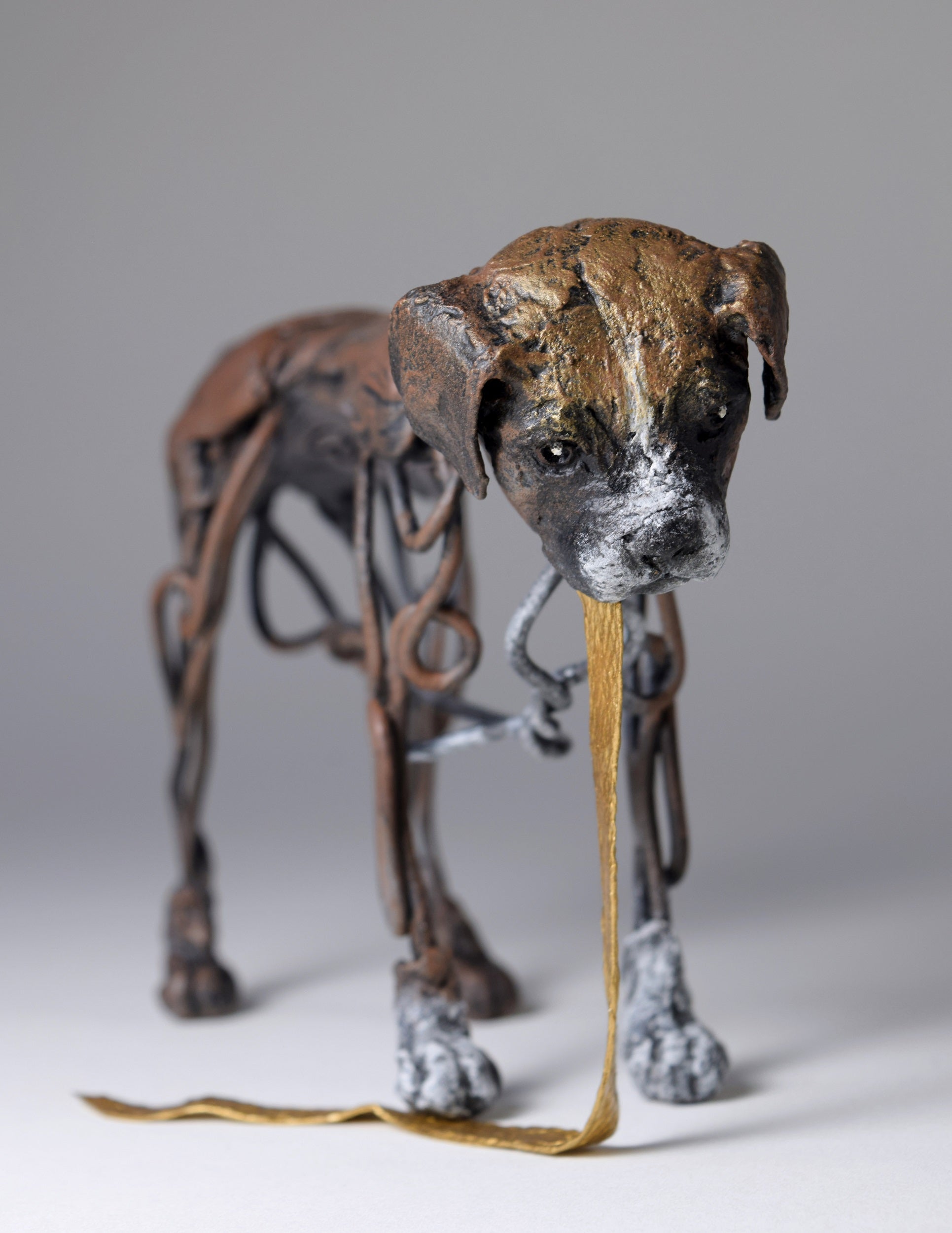 Air dry clay and wire boxer dog sculpture by Susie Benes