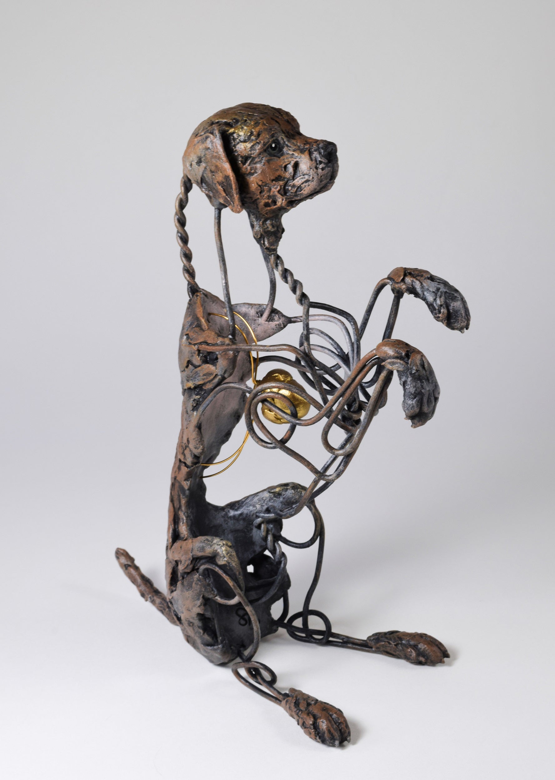 Air dry clay and wire dog sculpture by Susie Benes