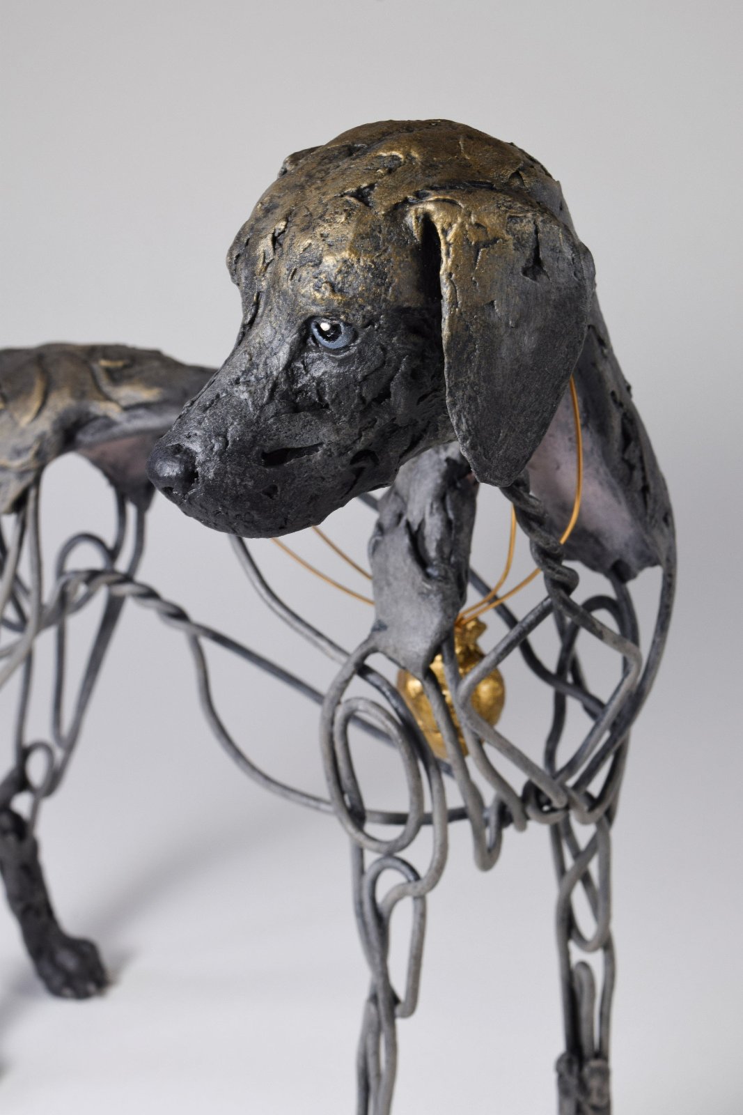 Air dry clay and wire dog sculpture by Susie Benes