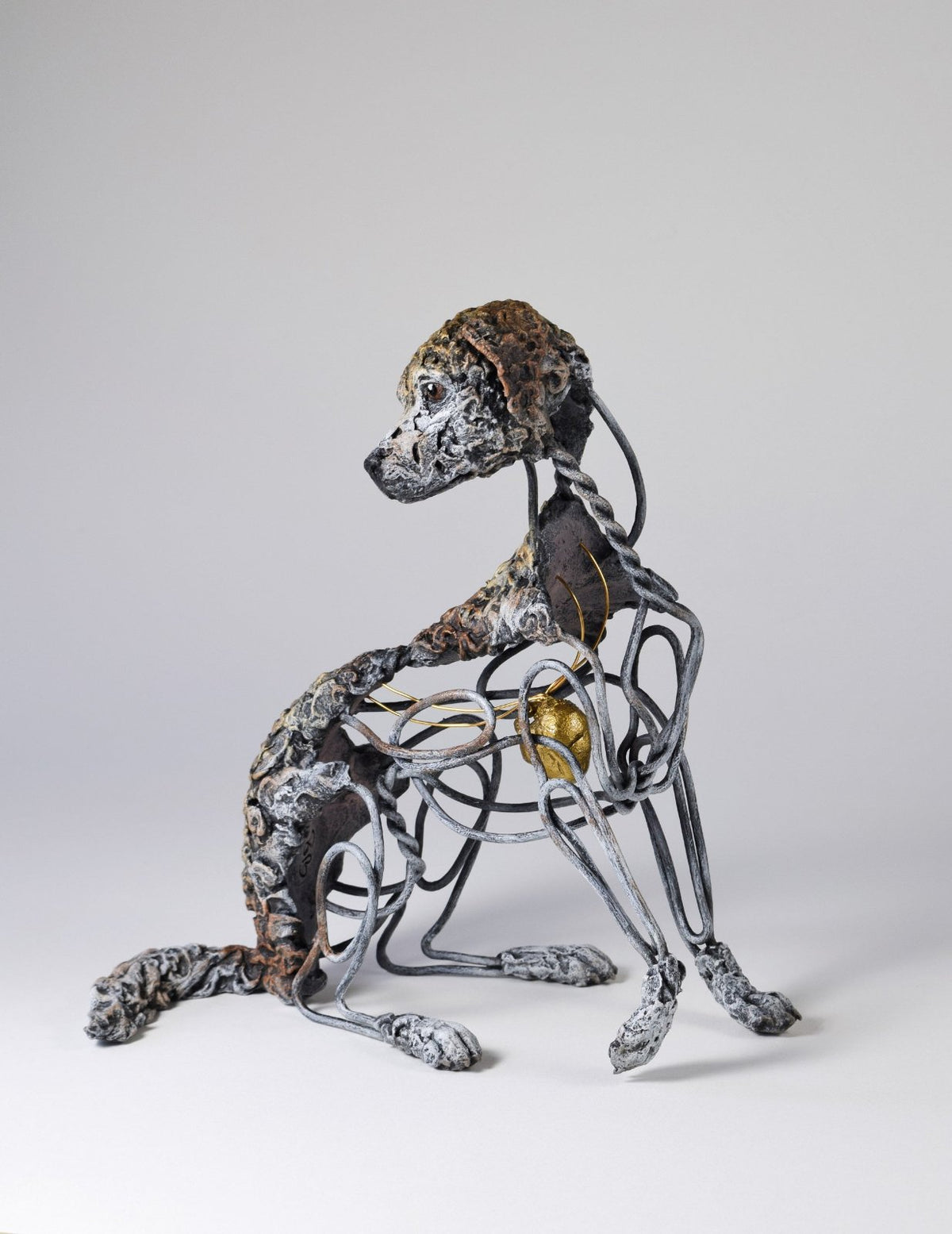 Air dry clay and wire dog sculpture by Susie Benes