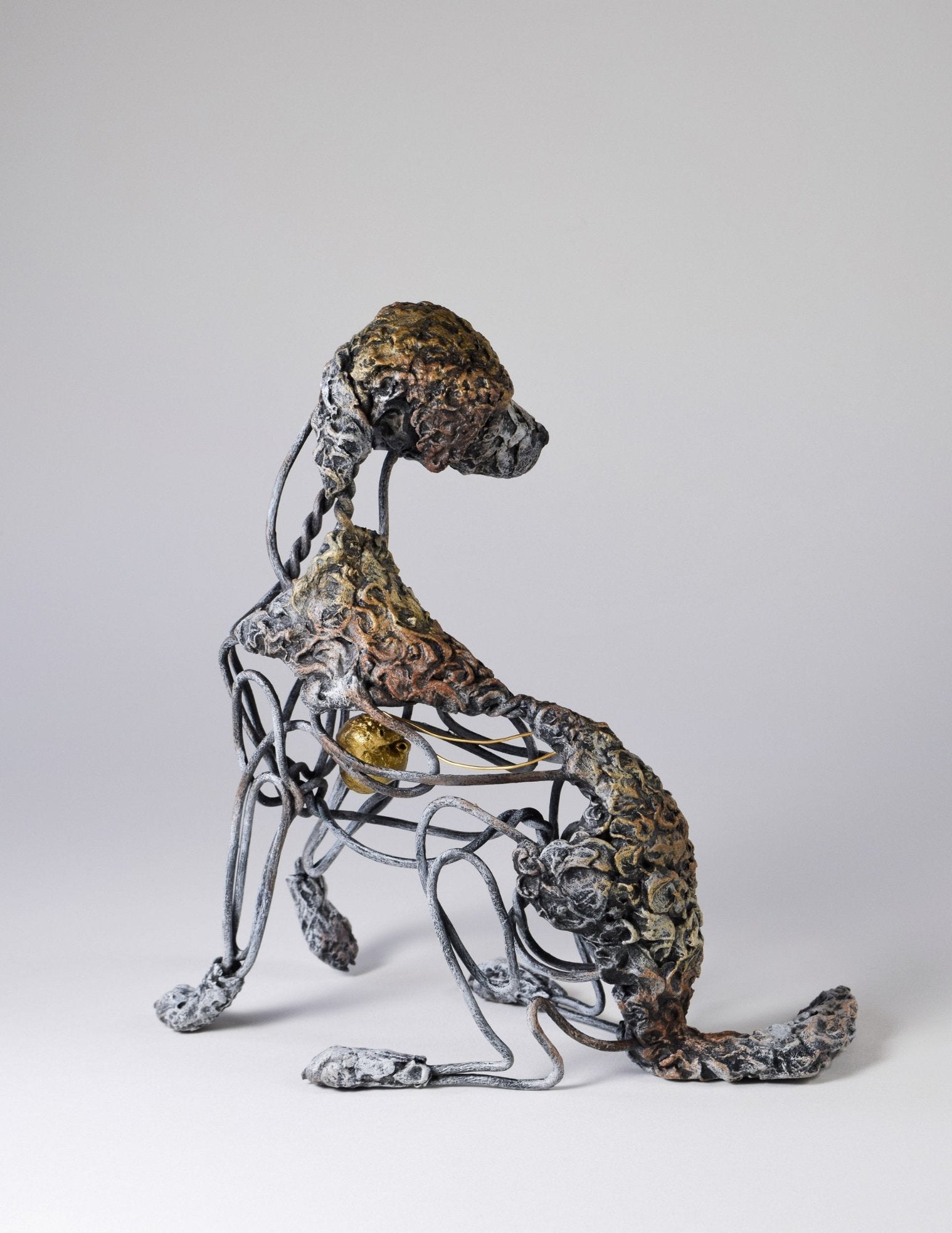 Air dry clay and wire dog sculpture by Susie Benes