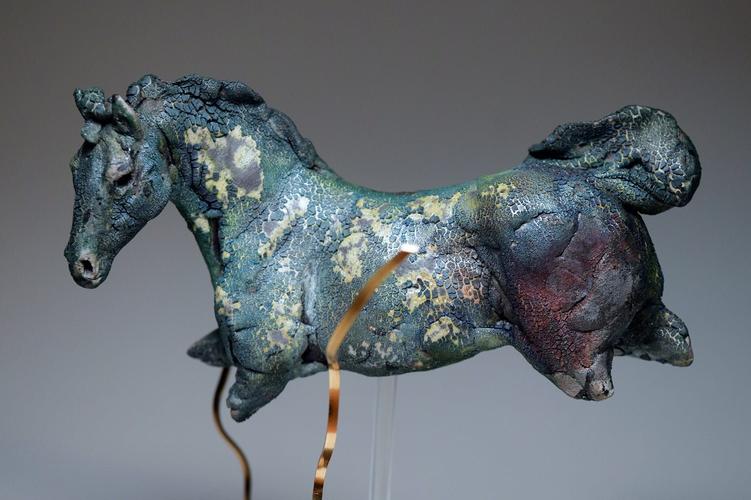 Blue aquatic horse in ceramic raku fired by Susie Benes