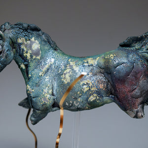 Blue aquatic horse in ceramic raku fired by Susie Benes