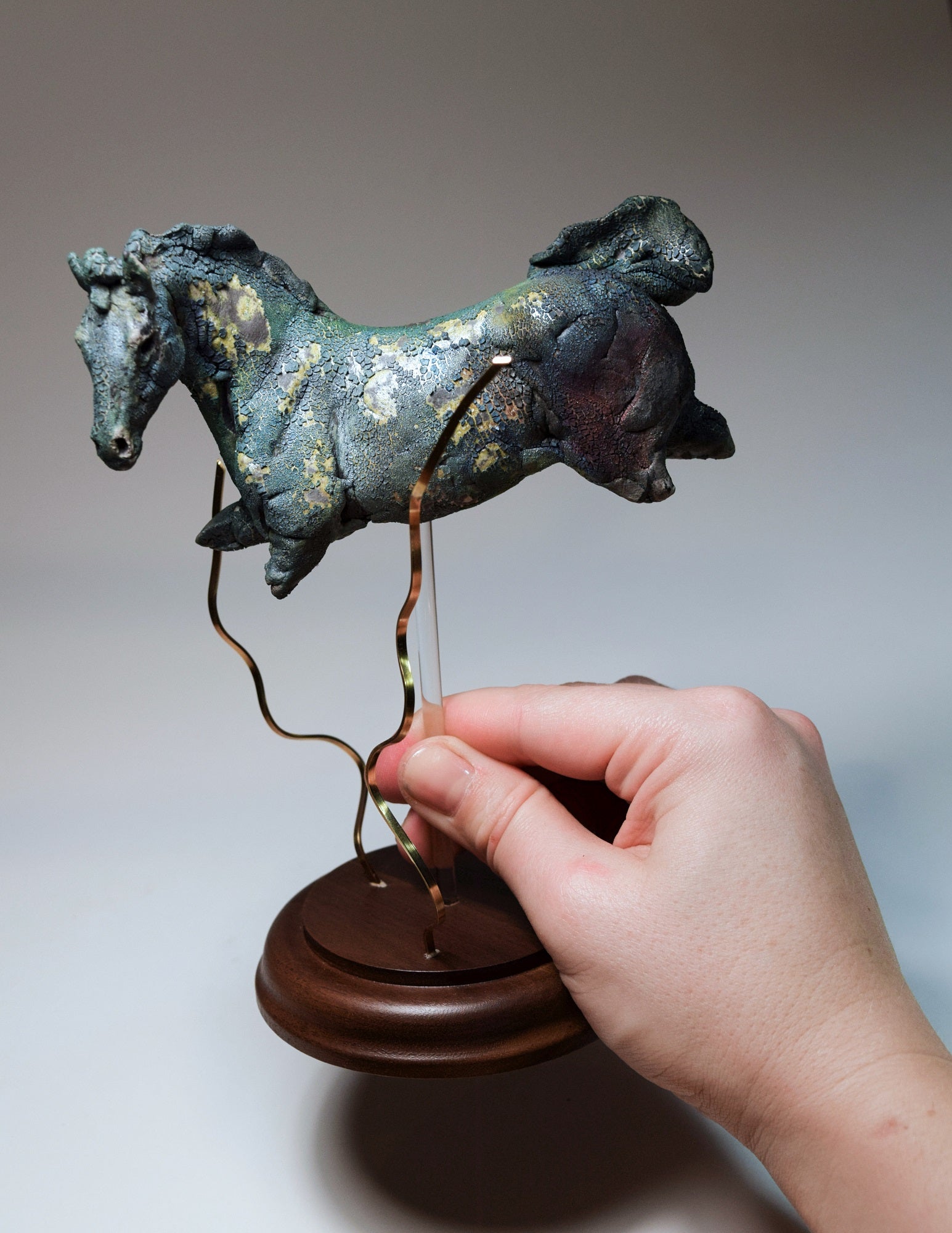 Blue aquatic horse in ceramic raku fired by Susie Benes