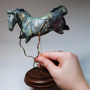 Blue aquatic horse in ceramic raku fired by Susie Benes