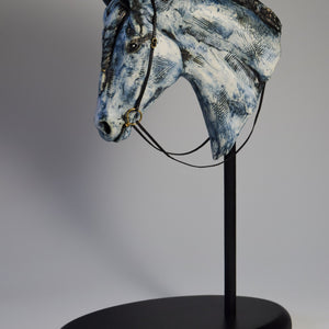 Blue ceramic horse head with braid sculpture by Susie Benes