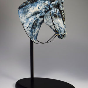 Blue ceramic horse head with braid sculpture by Susie Benes