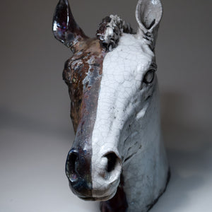 Raku ceramic horse head in black and white