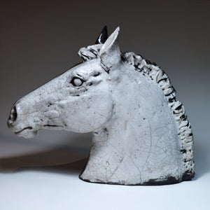 Raku ceramic horse head in black and white by Susie Benes