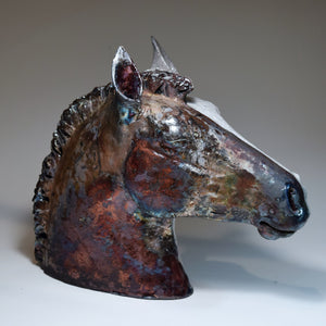 Raku ceramic horse head in black and white by Susie Benes