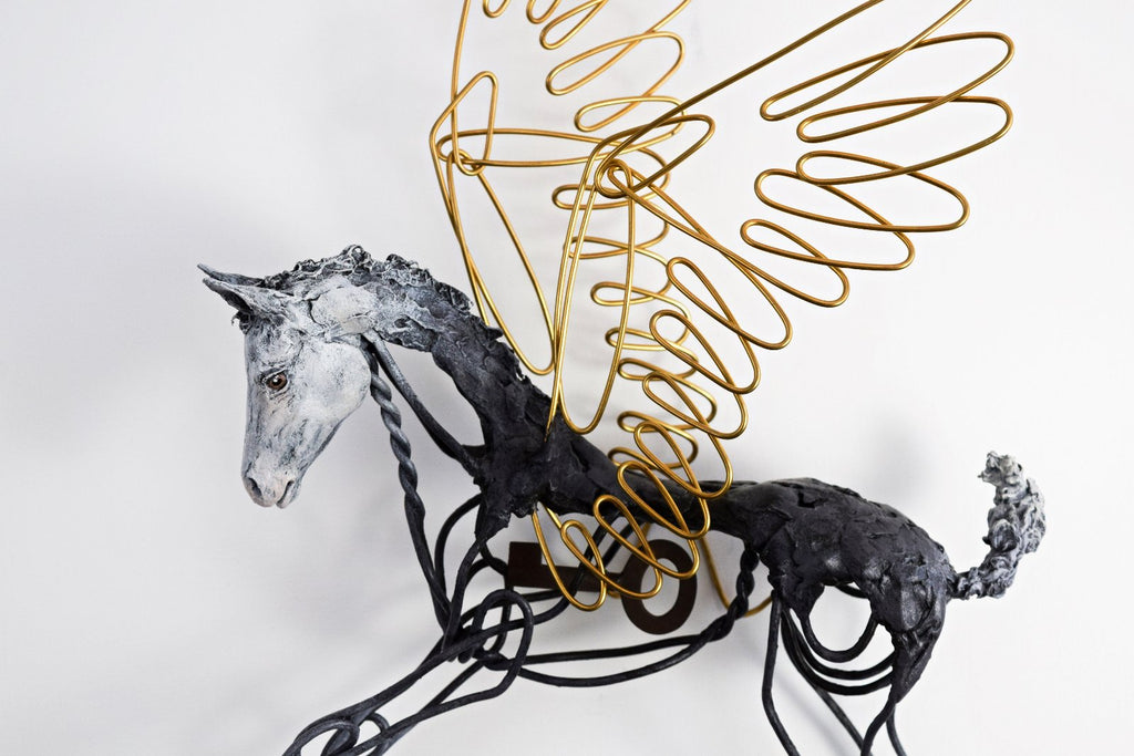 Air dry clay and wire pegasus foal wall sculpture