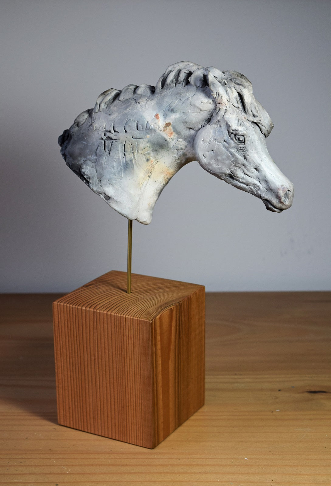 Smoke fired ceramic horse head sculpture by Susie Benes