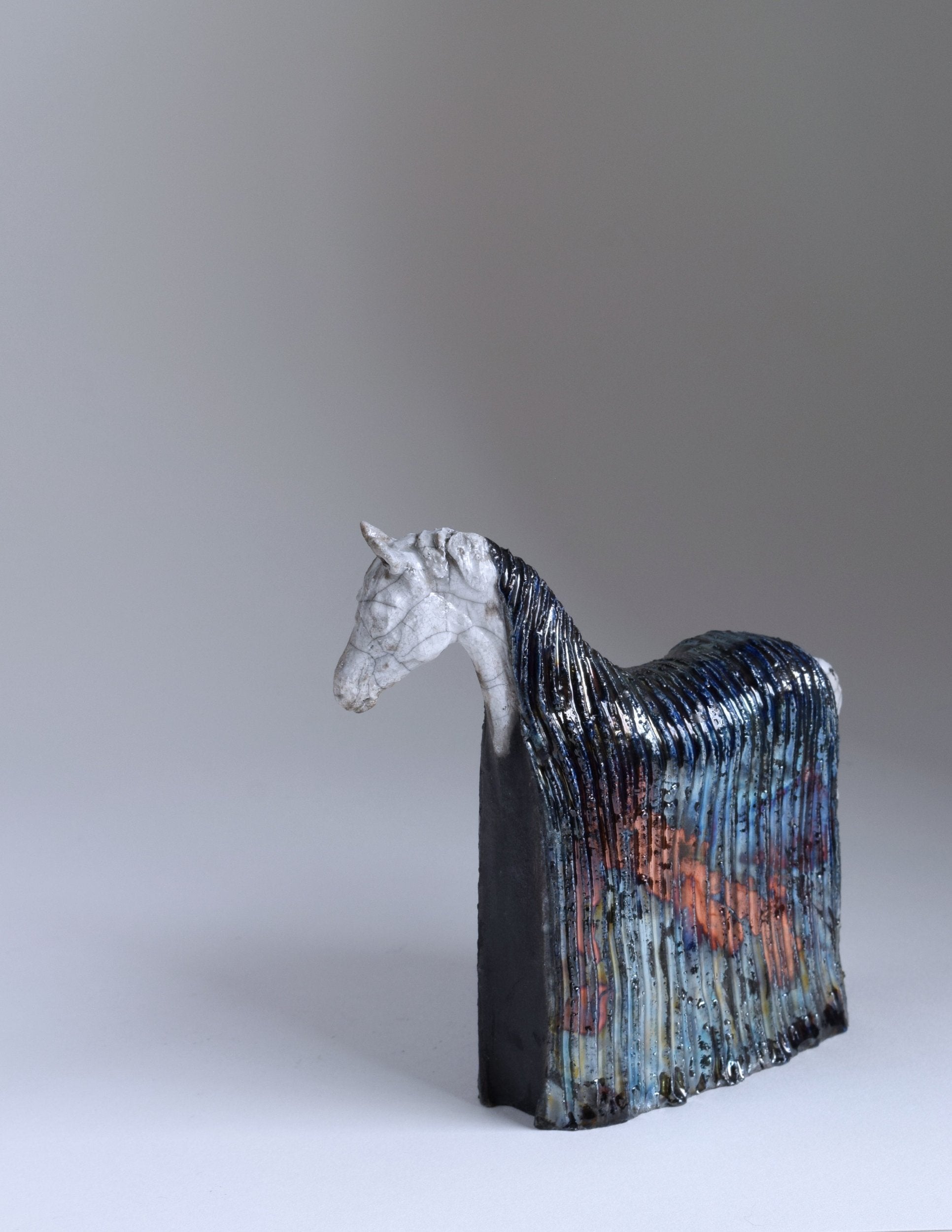 Metallic patterned blanket ceramic horse sculpture