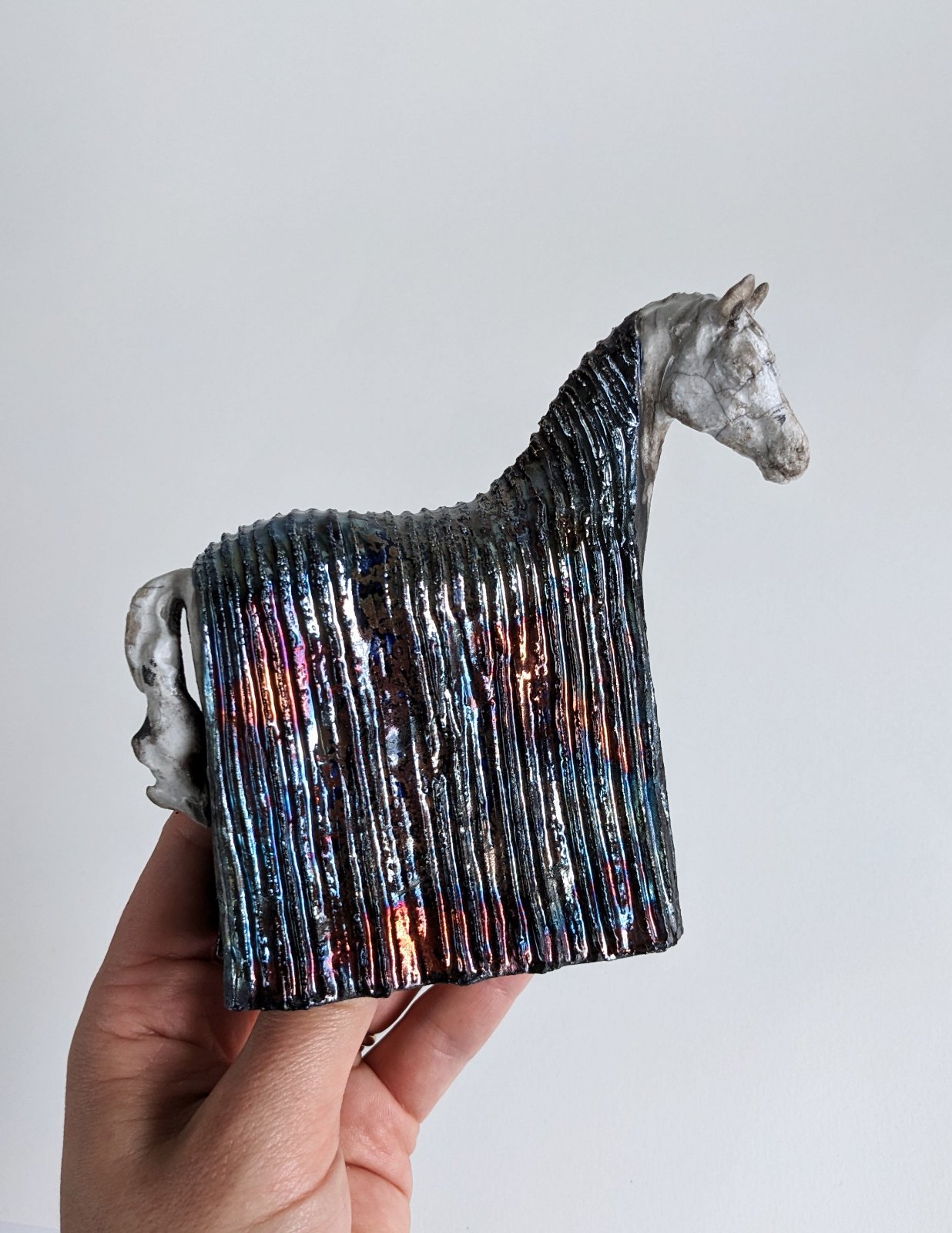 Metallic patterned blanket ceramic horse sculpture