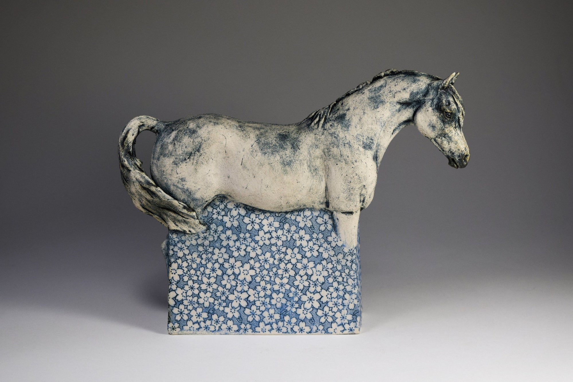 Ceramic horse sculpture with flower decals by Susie Benes