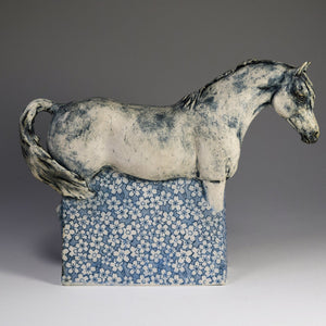 Ceramic horse sculpture with flower decals by Susie Benes