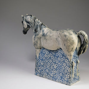 Ceramic horse sculpture with flower decals by Susie Benes